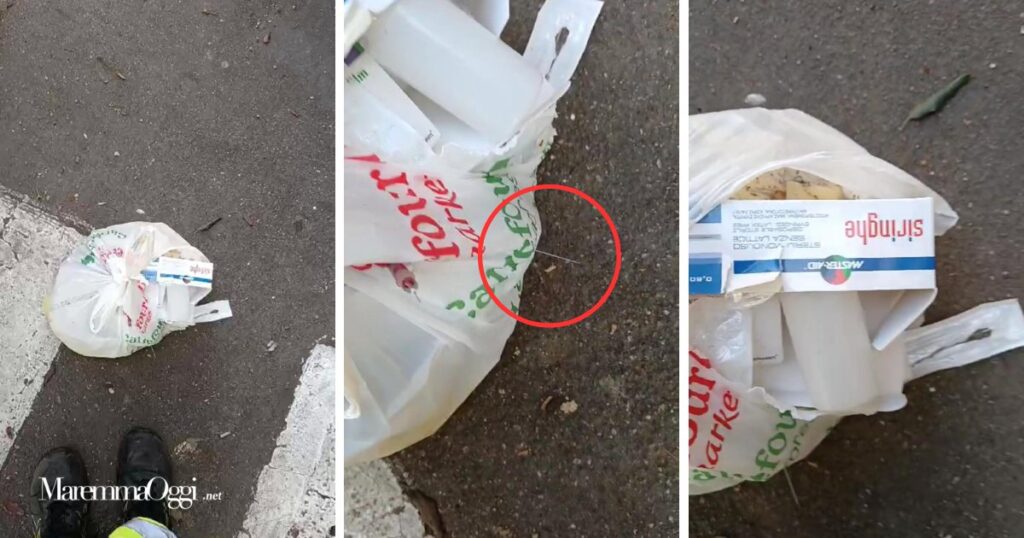 Il sacchetto di plastica con le siringhe